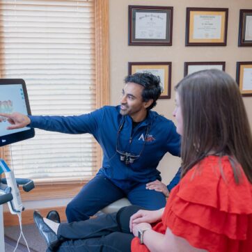 Peak Dental Arts dentist showing a patient an intraoral scan
